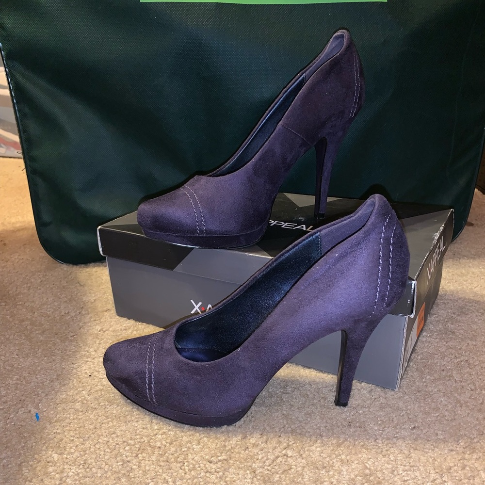 Purple suede pumps